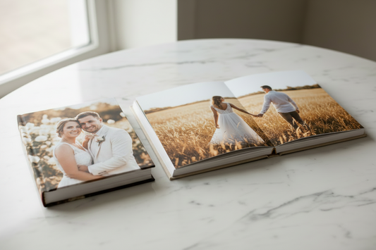 Premium lay-flat wedding album open to a two-page spread — a better alternative to Shutterfly wedding albums